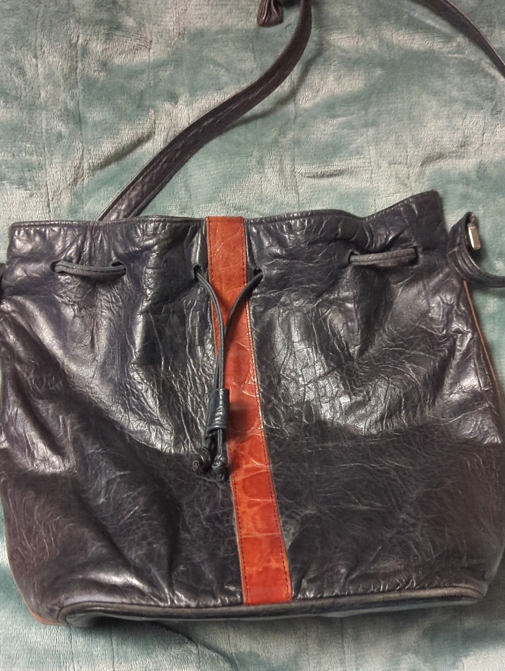 26-Black Leather Drawstring Tote with Brown Accent. Pre-loved.